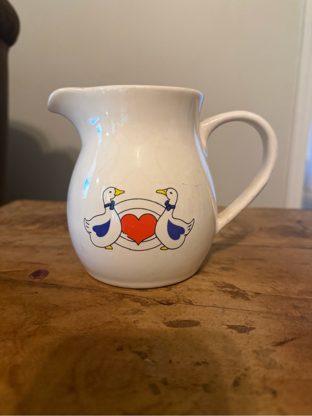 White Ceramic Pitcher with Blue Duck and Red Heart Motif